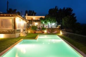 The swimming pool at or close to Metohi Nature Living