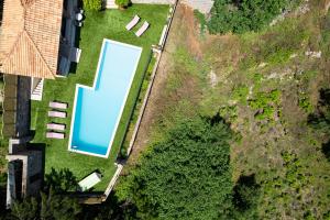 The swimming pool at or close to Metohi Nature Living