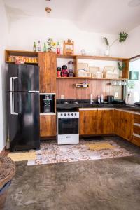 Dapur atau dapur kecil di Casa 3 amores Preá +23 gambar