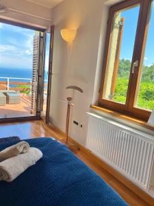 Postel nebo postele na pokoji v ubytování VILLA LOVRAN - 150m to the beach - infinity pool - incredible sea view - fitness room
