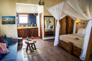Voodi või voodid majutusasutuse Clove Island Villas & Spa toas
