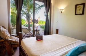 Voodi või voodid majutusasutuse Clove Island Villas & Spa toas