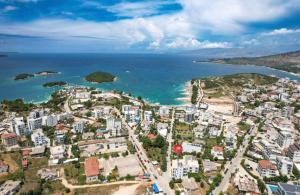 an aerial view of a city next to the ocean at Otto Hotel in Ksamil