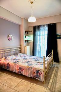 Postel nebo postele na pokoji v ubytování VOLOS CENTRAL SPACIOUS 120sq FLAT