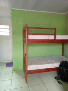 Bunk bed o mga bunk bed sa kuwarto sa Pousada Recanto da Villa