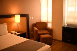 Postel nebo postele na pokoji v ubytování Mi Hotel Sandiego