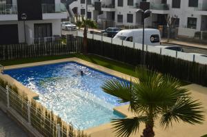 Bazén v ubytovaní Apt with Roof Terrace Pilar De La Horadada alebo v jeho blízkosti