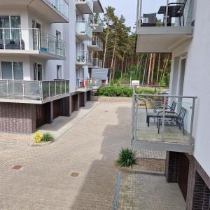 Balkón alebo terasa v ubytovaní APARTAMENT - PORTA MARE - LEŚNE TARASY - 45B/2