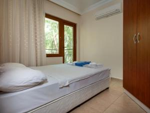 Postel nebo postele na pokoji v ubytování Apartment with Shared Pool Kalkan Apart Oleander (606)
