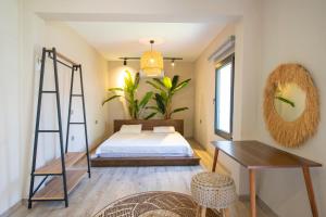 a bedroom with a bed and a ladder and a desk at Eroğlu Villas in Fethiye +90 photos
