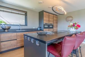 Cucina o angolo cottura di Natuurvilla 16 Weegeswaal Altre 27 foto