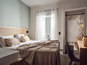 Postel nebo postele na pokoji v ubytování Villa Grimani