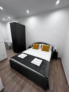 Postel nebo postele na pokoji v ubytování Citywise Vittorio - Independent Apartment near Bari central station