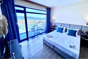 Postel nebo postele na pokoji v ubytování Hotel Penelope + 30 fotografií