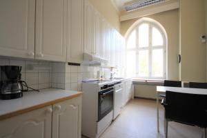 Kuchyň nebo kuchyňský kout v ubytování Forenom Hostel Röykkä + 37 fotografií