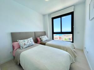 Łóżko lub łóżka w pokoju w obiekcie Luxury 3 Bedroom Penthouse