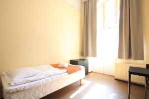 Postel nebo postele na pokoji v ubytování Forenom Hostel Röykkä