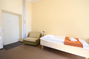 Postel nebo postele na pokoji v ubytování Forenom Hostel Röykkä