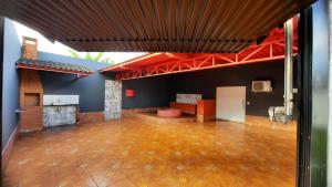 a large room with a dance floor and a ceiling at MOTEL HORA EXTRA in Jataí