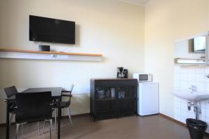 Kuchyň nebo kuchyňský kout v ubytování Forenom Hostel Röykkä