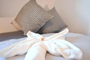Postel nebo postele na pokoji v ubytování NUE08-RI Apartment in Zirndorf