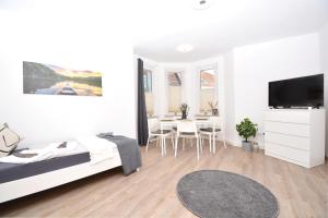 TV a/nebo společenská místnost v ubytování NUE08-RI Apartment in Zirndorf + 15 fotografií