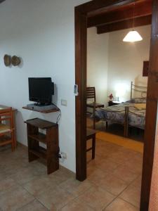 TV a/nebo společenská místnost v ubytování Agriturismo La Barca In Secca