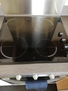 a microwave oven with a black top in a kitchen at Canal View 1 Bed Apartment in Zone 1 in London