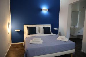 Postel nebo postele na pokoji v ubytování AGroom + 23 fotografií