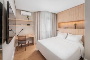 Ένα ή περισσότερα κρεβάτια σε δωμάτιο στο Address São Paulo Faria Lima by Intercity