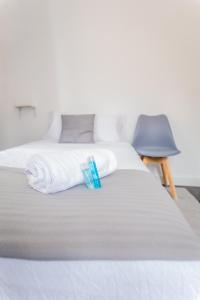 Posteľ alebo postele v izbe v ubytovaní Hostal San Pelayo