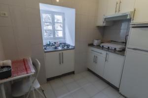 Kuchyňa alebo kuchynka v ubytovaní Hostal San Pelayo