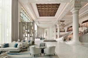 a lobby with couches and chairs in a building at Al Ahsa InterContinental, an IHG Hotel in Al Ahsa