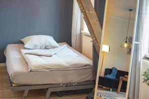Postel nebo postele na pokoji v ubytování Residenz unter den Linden Specht