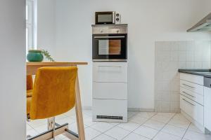 Kuchyň nebo kuchyňský kout v ubytování Residenz unter den Linden Specht