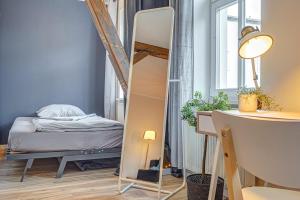 Postel nebo postele na pokoji v ubytování Residenz unter den Linden Specht