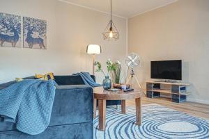 TV a/nebo společenská místnost v ubytování Residenz unter den Linden Specht