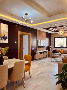 Posezení v ubytování Appartement moderne au décor raffiné