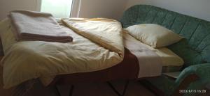 En eller flere senge i et værelse på Vlado