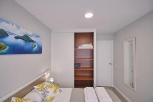 Posteľ alebo postele v izbe v ubytovaní La Casa de Julia Apartamento nuevo y céntrico