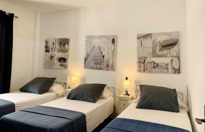 Postel nebo postele na pokoji v ubytování Urb Las Cañas I Apartamento F2