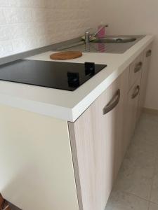 Kuchyň nebo kuchyňský kout v ubytování Manfredi Sea Room