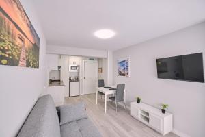 Kuchyňa alebo kuchynka v ubytovaní La Casa de Julia Apartamento nuevo y céntrico + 23 fotografií