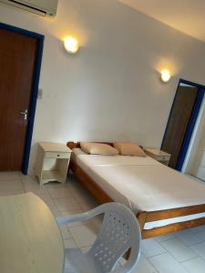 Postel nebo postele na pokoji v ubytování Residence Beach Azur