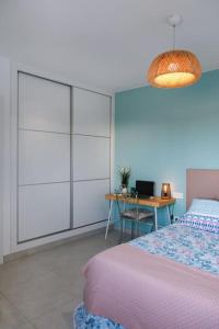 Postel nebo postele na pokoji v ubytování Apartamento Aguamarina Senator