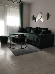 Predel za sedenje v nastanitvi Apartman Green!!