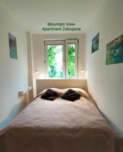 Postelja oz. postelje v sobi nastanitve Mountain View Apartment Zakopane