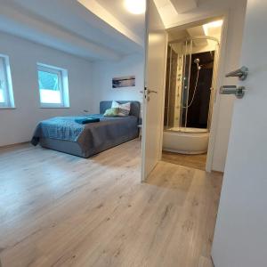 Postel nebo postele na pokoji v ubytování Hotel 24