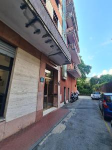 an empty street in front of a building at Nina Home 33 by PortofinoVacanze in Rapallo