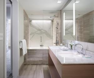 a bathroom with a large sink and a shower at The Ritz-Carlton, Chicago in Chicago